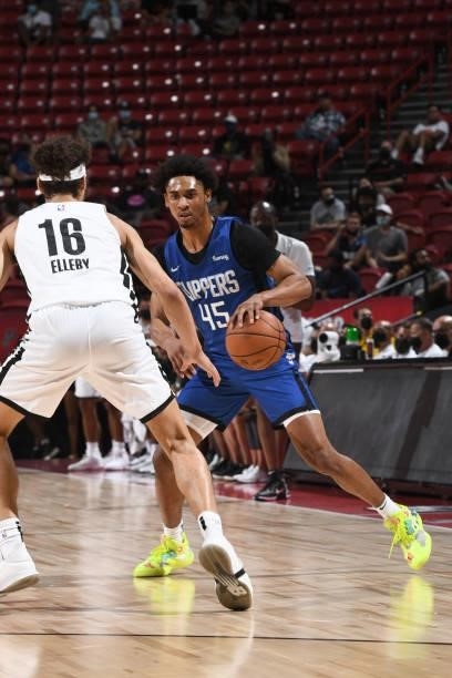 Keon Johnson of the LA Clippers handles the ball against the Portland Trail Blazers during the 2021 Las Vegas Summer League on August 10, 2021 at the...