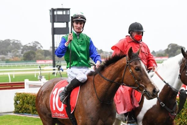 Quintello ridden by Teodore Nugent returns to the mounting yard after winning the Ladbrokes Easy Form Handicap at Ladbrokes Park Hillside Racecourse...