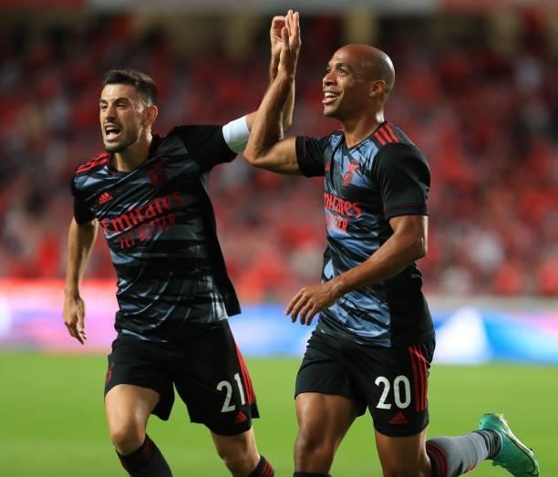 Joao Mario and Pizzi of SL Benfica celebrate after score a goal during the UEFA Champions League Third Qualifying Round Leg One match between SL...