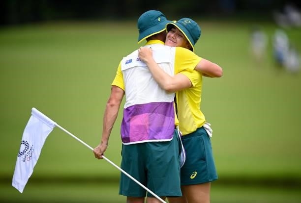 Saitama , Japan - 7 August 2021; Hannah Green of Australia and her caddie Nathan Blasko on the 18th during round four of the women's individual...