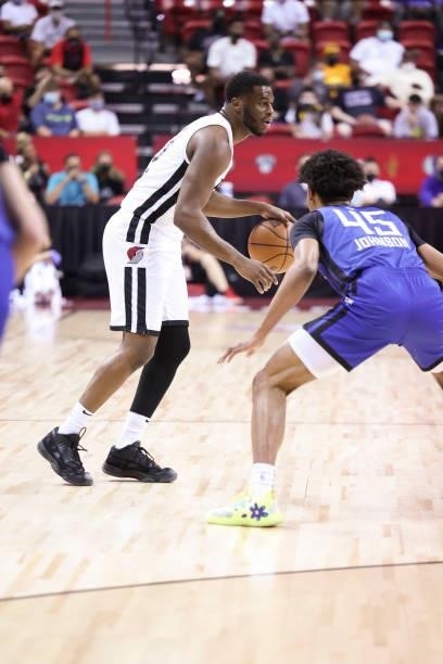 Emmanuel Mudiay of the Portland Trail Blazers handles the ball as Keon Johnson of the LA Clippers plays defense during the 2021 Las Vegas Summer...