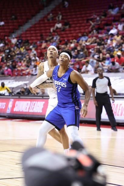 Michael Beasley of the Portland Trail Blazers and Isaiah Hicks of the LA Clippers fight for position during the 2021 Las Vegas Summer League on...