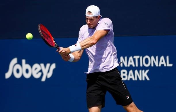 John Isner of the United States hits a shot against Cristian Garin of Chile during the second round on Day Three of the National Bank Open at Aviva...