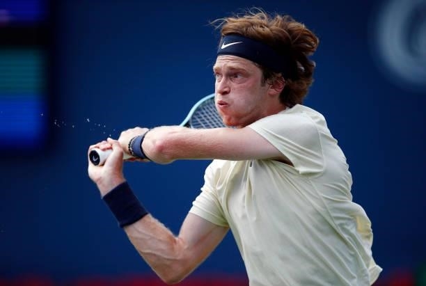 Andrey Rublev of Russia hits a shot against Fabio Fognini of Italy during the second round on Day Three of the National Bank Open at Aviva Centre on...