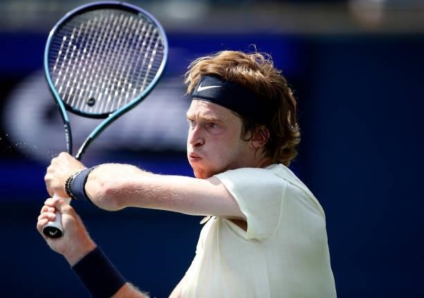 Andrey Rublev of Russia hits a shot against Fabio Fognini of Italy during the second round on Day Three of the National Bank Open at Aviva Centre on...