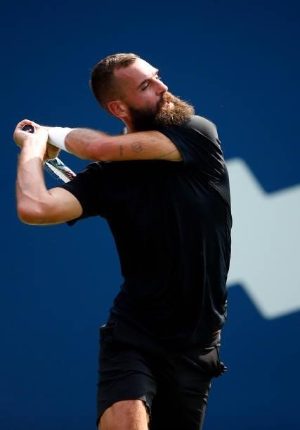 Benoit Paire of France hits a shot against Diego Schwartzman of Argentina during the second round on Day Three of the National Bank Open at Aviva...