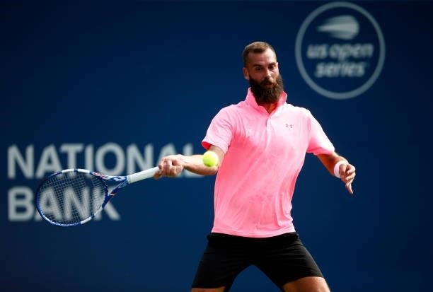 Benoit Paire of France hits a shot against Diego Schwartzman of Argentina during the second round on Day Three of the National Bank Open at Aviva...