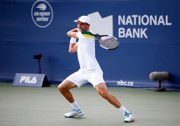 Roberto Bautista Agut of Spain hits a shot against Tommy Paul of the United States during the second round on Day Three of the National Bank Open at...