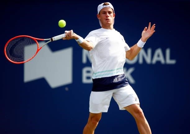 Diego Schwartzman of Argentina hits a shot against Benoit Paire of France during the second round on Day Three of the National Bank Open at Aviva...