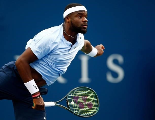 Frances Tiafoe of the United States serves against Denis Shapovalov of Canada during the second round on Day Three of the National Bank Open at Aviva...