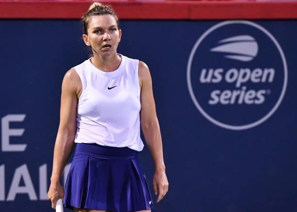 Simona Halep of Romania looks on after losing a point during her Women's Singles second round match against Danielle Collins of the United States on...