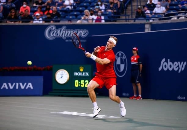 Denis Shapovalov of Canada hits a shot against Frances Tiafoe of the United States during the second round on Day Three of the National Bank Open at...