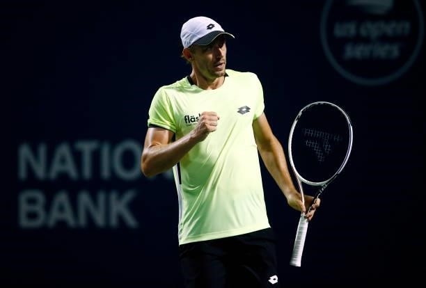 John Millman of Australia reacts after winning a point against Gael Monfils of France during the second round on Day Three of the National Bank Open...