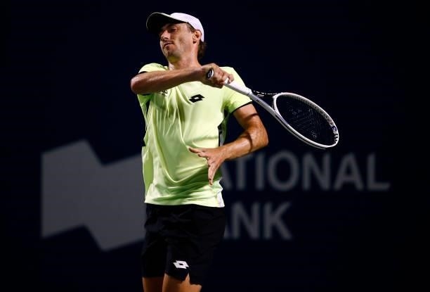 John Millman of Australia hits a shot against Gael Monfils of France during the second round on Day Three of the National Bank Open at Aviva Centre...