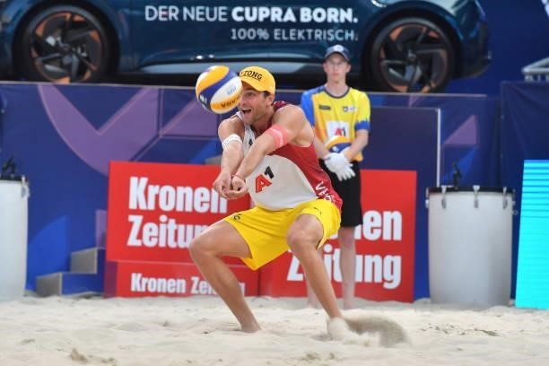 Robin Valentin Seidl of Austria bumps during the pool match between Christian Sandlie Sorum and Anders Berntsen Mol of Norway and Robin Valentin...