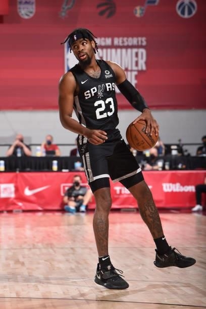 Malik Newman of the San Antonio Spurs handles the ball against the Charlotte Hornets during the 2021 Las Vegas Summer League on August 12, 2021 at...
