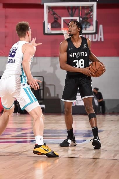Kaleb Johnson of the San Antonio Spurs handles the ball against the Charlotte Hornets during the 2021 Las Vegas Summer League on August 12, 2021 at...