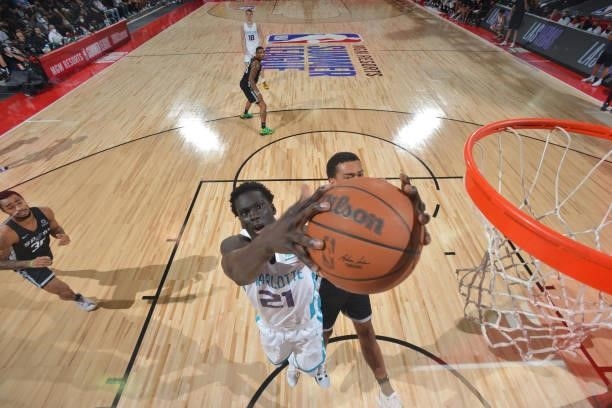 Justin Robinson of the San Antonio Spurs blocks the shot of JT Thor of the Charlotte Hornets during the 2021 Las Vegas Summer League on August 12,...