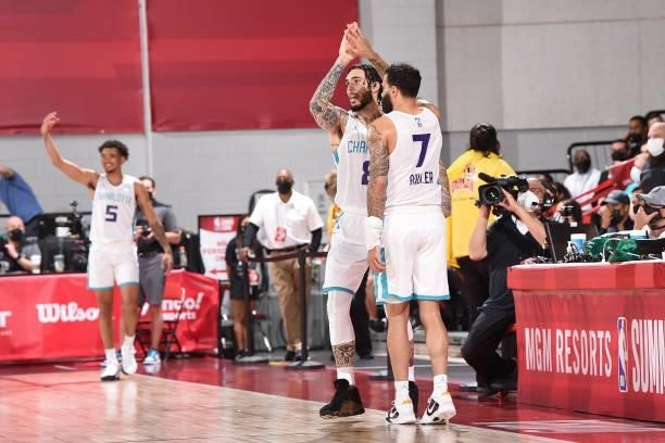 LiAngelo Ball of Charlotte Hornets high fives Grant Riller of the Charlotte Hornets during the 2021 Las Vegas Summer League on August 12, 2021 at the...