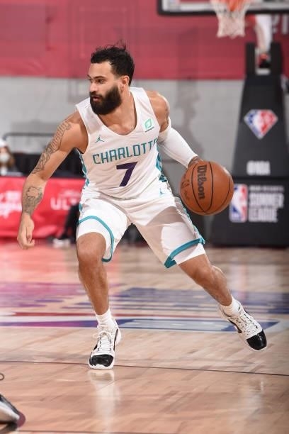 Grant Riller of the Charlotte Hornets drives to the basket against the San Antonio Spurs during the 2021 Las Vegas Summer League on August 12, 2021...