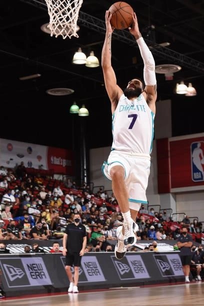Grant Riller of the Charlotte Hornets drives to the basket against the San Antonio Spurs during the 2021 Las Vegas Summer League on August 12, 2021...