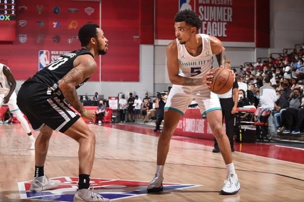 James Bouknight of Charlotte Hornets handles the ball against the San Antonio Spurs during the 2021 Las Vegas Summer League on August 12, 2021 at the...