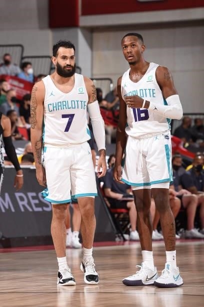 Grant Riller of the Charlotte Hornets and Scottie Lewis of Charlotte Hornets look on during the 2021 Las Vegas Summer League on August 12, 2021 at...