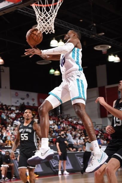 Scottie Lewis of Charlotte Hornets drives to the basket against the San Antonio Spurs during the 2021 Las Vegas Summer League on August 12, 2021 at...