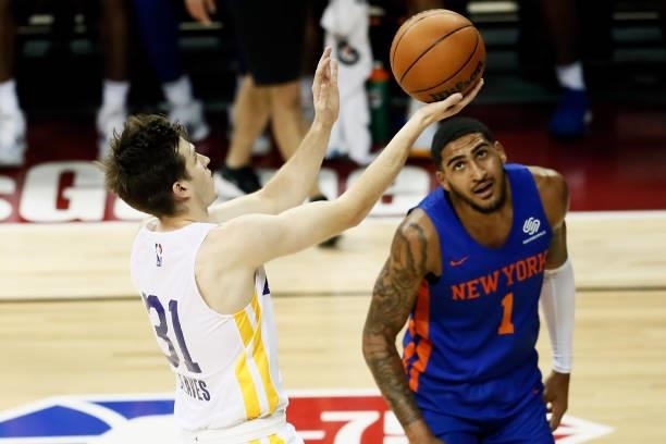 Austin Reaves of the Los Angeles Lakers drives to the basket against the New York Knicks during the 2021 Las Vegas Summer League on August 11, 2021...