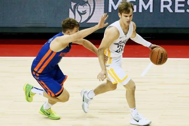 Mac McClung of the Los Angeles Lakers dribbles the ball against the New York Knicks during the 2021 Las Vegas Summer League on August 11, 2021 at the...