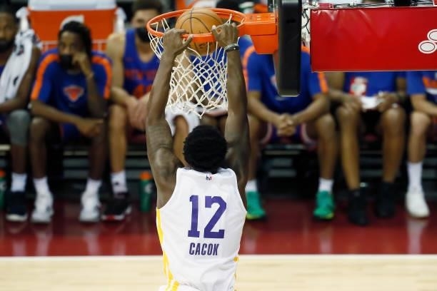 Devontae Cacok of the Los Angeles Lakers dunks the ball against the New York Knicks during the 2021 Las Vegas Summer League on August 11, 2021 at the...