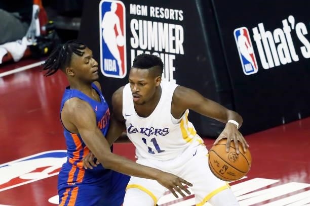 Immanuel Quickley of the New York Knicks plays defense Joel Ayayi of the Los Angeles Lakers during the 2021 Las Vegas Summer League on August 11,...