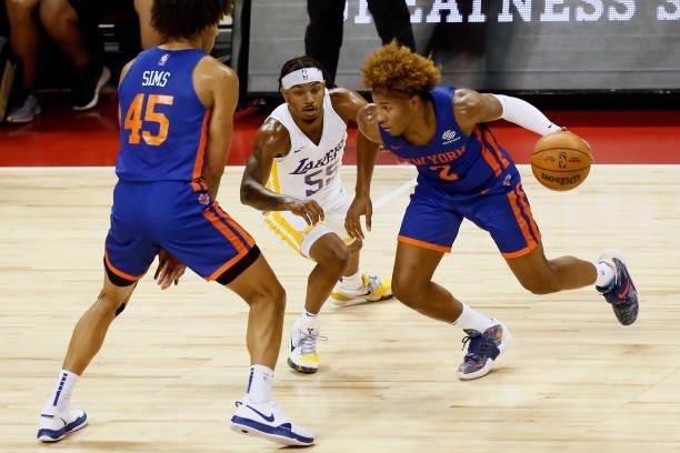 Miles McBride of the New York Knicks dribbles the ball against the Los Angeles Lakers during the 2021 Las Vegas Summer League on August 11, 2021 at...