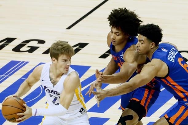 Mac McClung of the Los Angeles Lakers looks to pass the ball against the New York Knicks during the 2021 Las Vegas Summer League on August 11, 2021...
