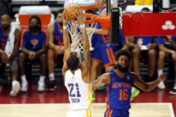 Trevelin Queen of the Los Angeles Lakers dunks the ball against the New York Knicks during the 2021 Las Vegas Summer League on August 11, 2021 at the...