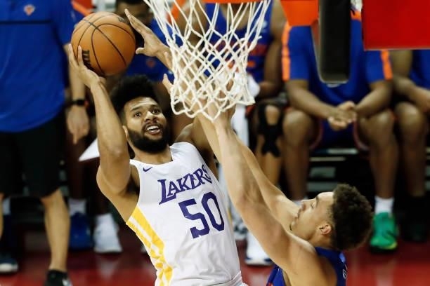 Yoeli Childs of the Los Angeles Lakers drives to the basket against the New York Knicks during the 2021 Las Vegas Summer League on August 11, 2021 at...