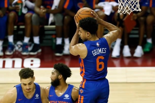 Quentin Grimes of the New York Knicks rebounds the ball against the Los Angeles Lakers during the 2021 Las Vegas Summer League on August 11, 2021 at...