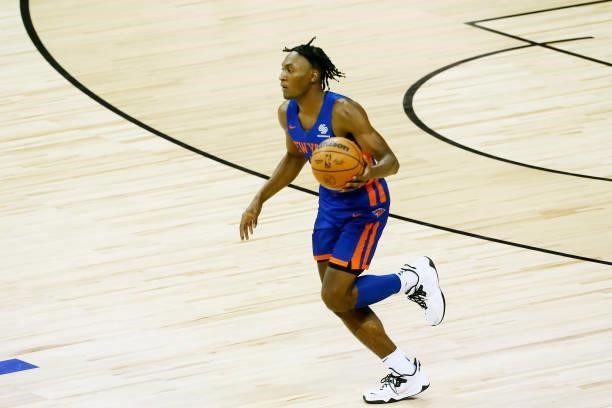 Immanuel Quickley of the New York Knicks dribbles the ball against the Los Angeles Lakers during the 2021 Las Vegas Summer League on August 11, 2021...