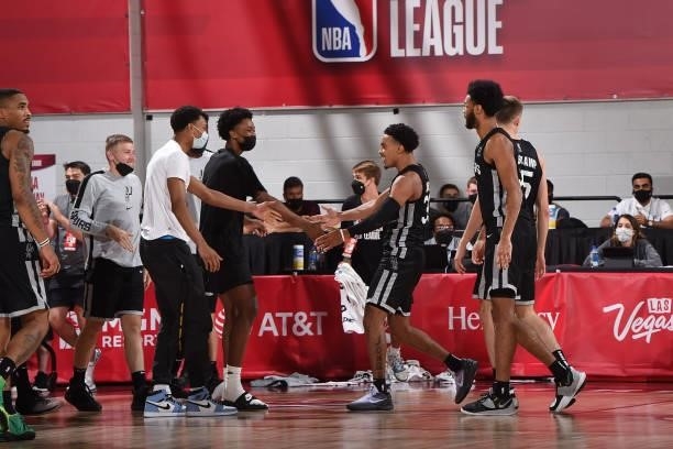 Tre Jones of the San Antonio Spurs celebrates scoring the game winning basket against the Charlotte Hornets during the 2021 Las Vegas Summer League...