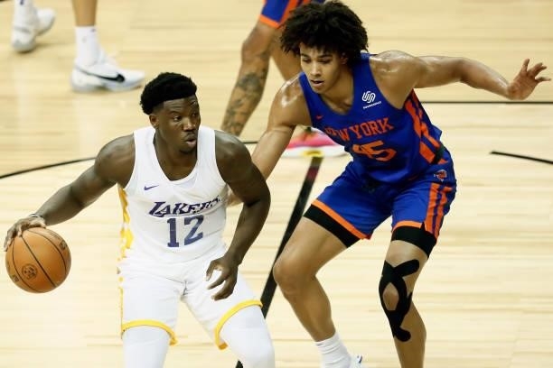 Devontae Cacok of the Los Angeles Lakers dribbles the ball against the New York Knicks during the 2021 Las Vegas Summer League on August 11, 2021 at...