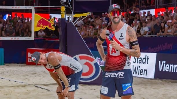 Alexander Horst and Clemens Doppler of Austria during the farewell on Day 2 of the A1 CEV EuroBeachVolley Vienna 2021 at Red Bull Beach Arena on...