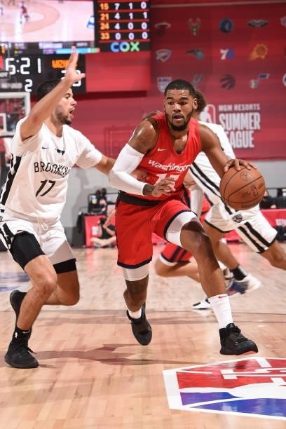Mason Jones of the Washington Wizards drives to the basket against the Brooklyn Nets during the 2021 Las Vegas Summer League on August 12, 2021 at...