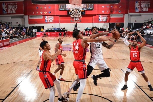 Chris Silva of the Brooklyn Nets drives to the basket against the Washington Wizards during the 2021 Las Vegas Summer League on August 12, 2021 at...