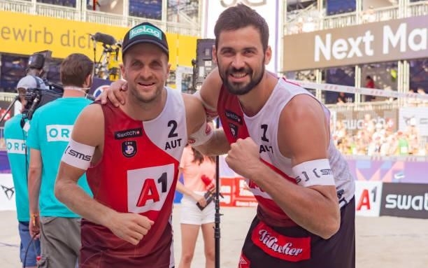 Alexander Huber Christoph Dressler and of Austria after the pool match against Nils Ehlers and Lukas Pfretzschner of Germany on Day 2 of the A1 CEV...
