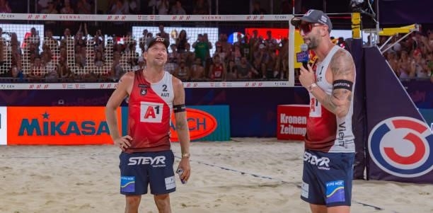 Alexander Horst and Clemens Doppler of Austria during the farewell on Day 2 of the A1 CEV EuroBeachVolley Vienna 2021 at Red Bull Beach Arena on...