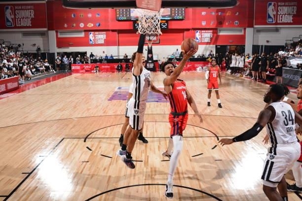 Isaiah Todd of the Washington Wizards drives to the basket against the Brooklyn Nets during the 2021 Las Vegas Summer League on August 12, 2021 at...