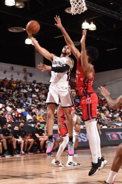 Quinndary Weatherspoon of the Brooklyn Nets drives to the basket against the Washington Wizards during the 2021 Las Vegas Summer League on August 12,...