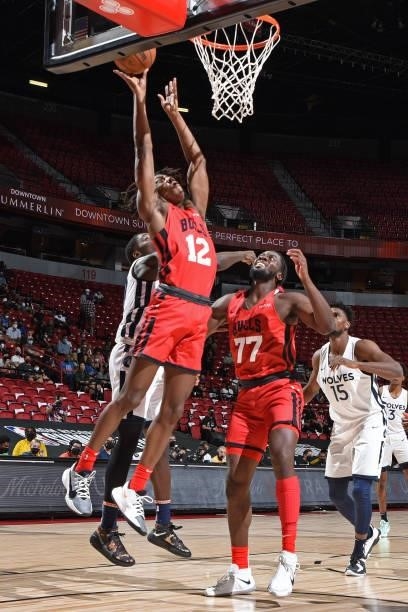 Ayo Dosunmu of the Chicago Bulls drives to the basket against the Minnesota Timberwolves during 2021 Las Vegas Summer League on August 12, 2021 at...