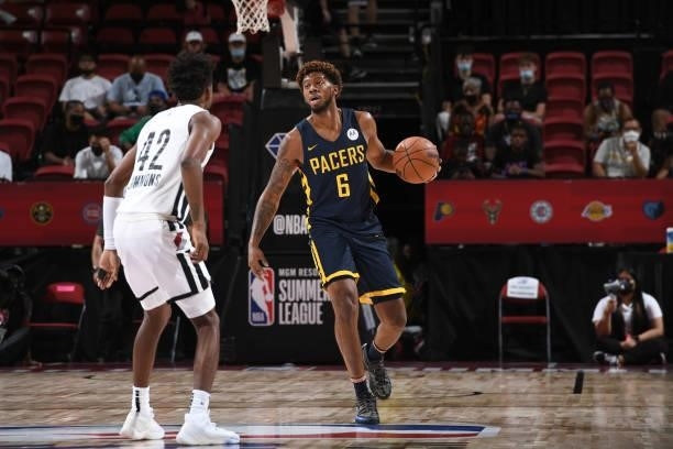 Tyrone Wallace of the Indiana Pacers dribbles the ball against the Portland Trail Blazers during the 2021 Las Vegas Summer League on August 9, 2021...