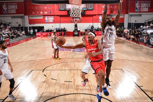 Jordan Goodwin of the Washington Wizards drives to the basket against the Brooklyn Nets during the 2021 Las Vegas Summer League on August 12, 2021 at...